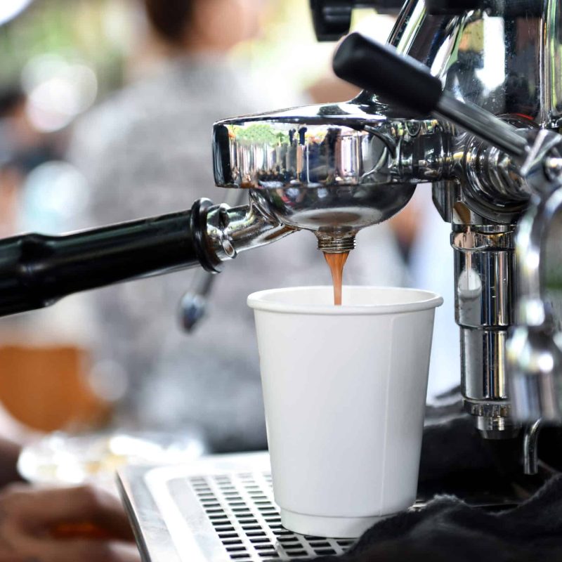 Coffee makers with take away cup.